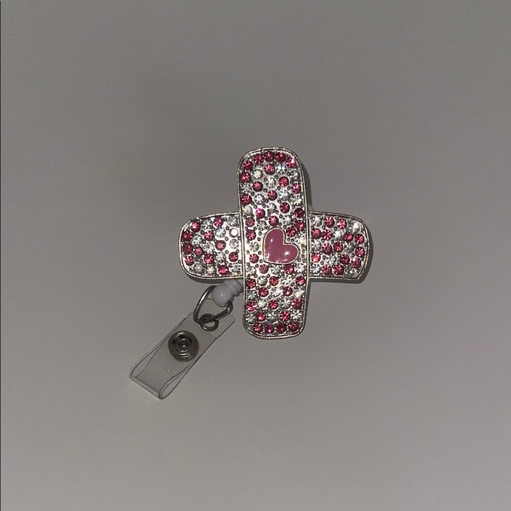Pink and Silver Bandaid Badge Reel